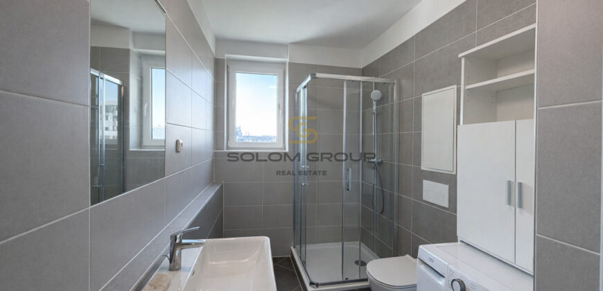 Pronájem NOVÉHO bytu 1+kk/Balkon, 47,3 m² + garážové stání + sklep, Dolní Měcholupy, ulice Honzíkova